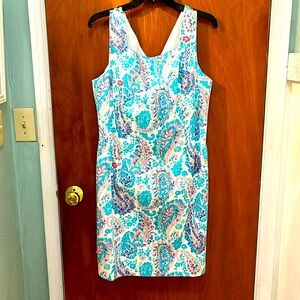 Talbots floral sun dress. V back with zipper. Lined.  Sleeveless , never worn
